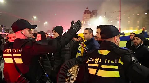 Police escort Maccabi Tel Aviv supporters in Amsterdam (Photo | AP)