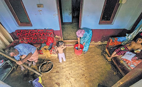A family back in house at Chooralmala which was damaged in the landslide 