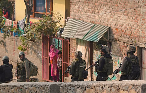 Security personnel during an encounter with terrorists on the outskirts of Srinagar, on Sunday, Nov. 10, 2024. 