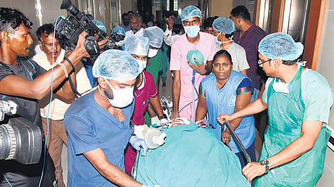Dr Balaji being rushed for treatment after the attack on Wednesday 