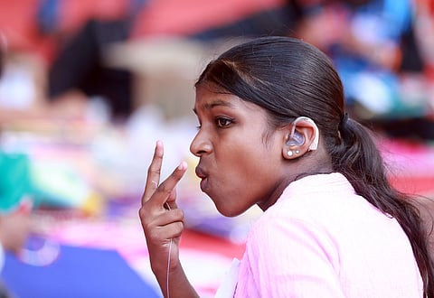 Differently abled students interacting sign languages during the  work experience category at the state school science fair at Alappuzha 