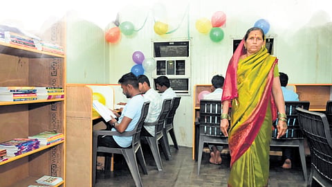 Mallavva Meti at her newly-established  library in Mantur village in Raibag, Belagavi district