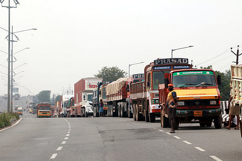 Vellore imposes heavy vehicle ban during peak hours to reduce traffic congestion, sparking protests from truck drivers
