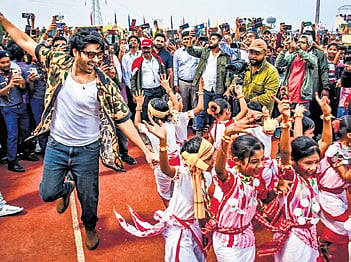 Actor Utkarsh dancing along with KISS students during the promotion of his movie Vanvaas on Tuesday.