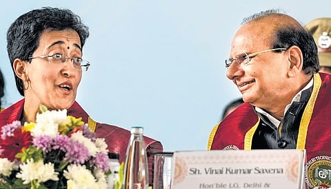 Lt. Governor VK Saxena and CM Atishi.