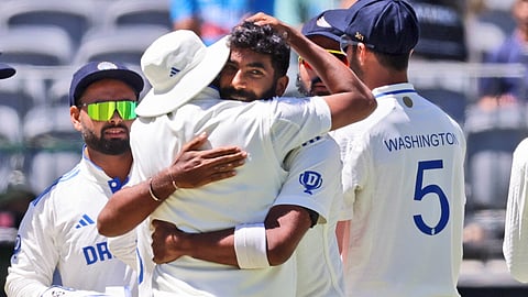 India's captain Jasprit Bumrah, facing the camera, celebrates the wicket of Australia's Alex Carey on the second day of the first cricket test between Australia and India in Perth, Australia, Saturday, Nov. 23, 2024.
