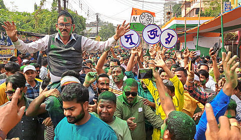 Trinamool Congress supporters celebrate party candidate Sujoy Hazra's victory in Medinipur Sadar by-elections, in West Medinipur on Saturday.
