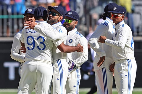 Indian team celebrating the win against Australia in the first Test of the five-match series. 