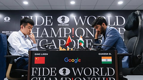 Ding Liren (L) and D Gukesh