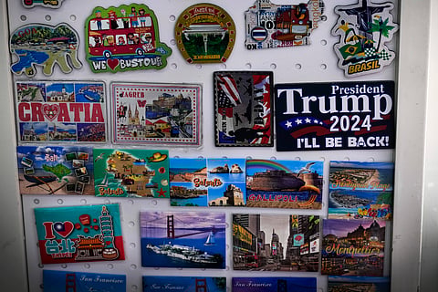 A fridge magnet that reads "President Donald Trump 2024" is displayed at a store at the Yiwu wholesale market in Yiwu, east China's Zhejiang province, Nov. 8, 2024. 