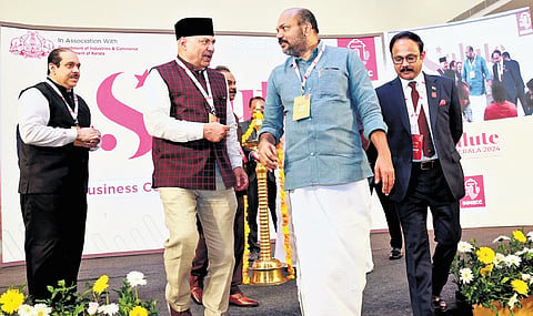 Entrepreneur Dr P Mohammed Ali of Galfar with Industries Minister P Rajeeve during ‘Salute Kerala 2024’ on Tuesday 