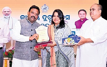 Nilam Samantray being felicitated by Mallik on Tuesday