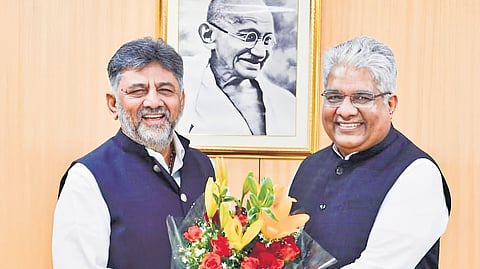 Deputy Chief Minister DK Shivakumar greets Union Forest Minister Bhupender Yadav in New Delhi on Wednesday  