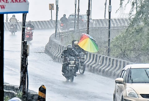 Motorists seen on the Pattravakkam bridge in Chennai on Friday