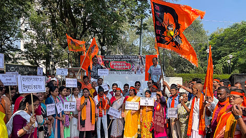 Members and supporters of 'Hindu Sangarsh Samity' participate in a protest march demanding the release of ISKCON monk Chinmoy Krishna Das, who was arrested in Bangladesh, in Agartala on Monday. 