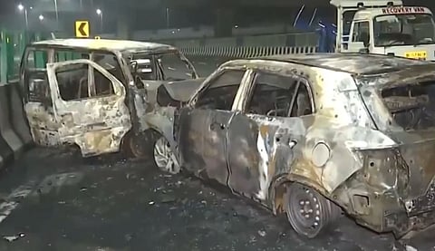 The charred remains of the cars.