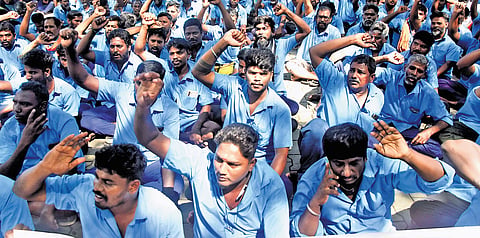 Sanitary workers of Chennai metro water staging a protest on Thursday 