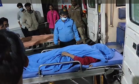Death of a woman during a stampede outside the theatre.