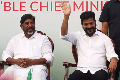 Chief Minister A Revanth Reddy waves 