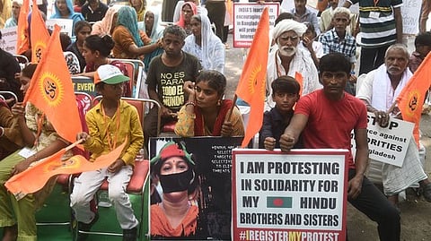 Members of Hindu organisations protest over the violence against minorities in Bangladesh, at  Jantar Mantar in New Delhi.