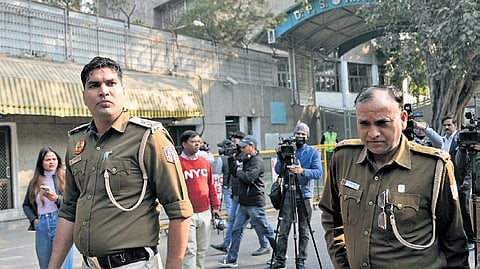 Police personnel outside DPS RK Puram during an investigation 
