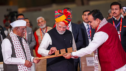 Prime Minister Narendra Modi with Rajasthan Governor Haribhau Kisanrao Bagde and Chief Minister Bhajanlal Sharma during the Rising Rajasthan Global Investment Summit, in Jaipur, Monday.