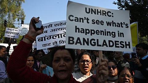 Protesters demonstrate to condemn the atrocities against Bangladesh's Hindu minority community in New Delhi on December 10, 2024.