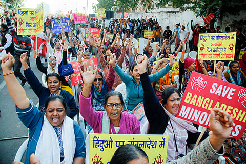 Members of various Hindu outfits and other organisations protest rally against atrocities on Bangladeshi Hindus, in Ahmedabad, Tuesday, Dec. 10, 2024. 
