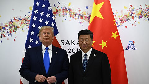 Chinese President Xi Jinping (R) and then- US President Donald Trump attend their bilateral meeting on the sidelines of the G20 Summit in Osaka on June 29, 2019. 