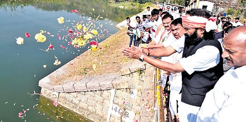Irrigation Minister N Uttam Kumar Reddy performs puja before releasing water for second crop from Nizamsagar project in Kamareddy district on Friday