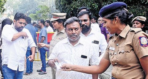 Journalists arriving at Chennai Press Club to cast their votes on Sunday 
