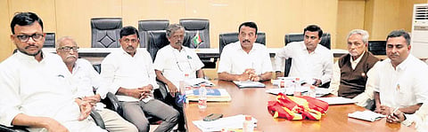 Karnataka Border Area Development Authority Chairman Somanna Bevinmarad addresses the media in Belagavi on Monday 