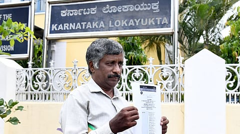 Complainant Snehamayi Krishna seen at the Lokayukta Police office in Mysuru.