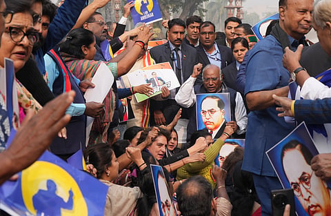 Congress President Mallikarjun Kharge, Priyanka Gandhi and other INDIA Bloc MPs take part in a protest march demanding an apology and resignation of Union Home Minister Amit Shah over his remarks on Babasaheb Ambedkar, at Parliament complex, in New Delhi