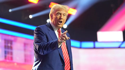 President-elect Donald Trump speaks at AmericaFest, Sunday, Dec. 22, 2024, in Phoenix.