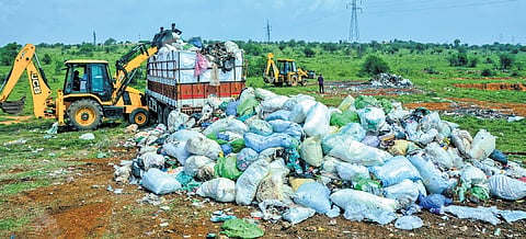 Medical and other waste that was illegally dumped at Tirunelveli in Tamil Nadu being removed by authorities from Kerala 