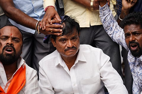 Condemning the incident, BJP party workers staged a protest in front of Dr Rajkumar's memorial in Sree Kanteerava Studio.