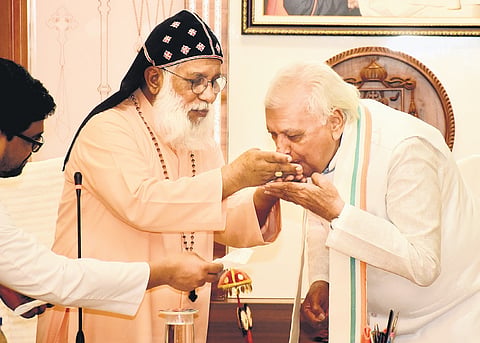 Cardinal Baselios Cleemis of the Syro-Malankara Catholic Church offering a piece of Christmas cake to outgoing Governor Arif Mohammed Khan, who called on him at the Major Archbishop’s House at Pattom in Thiruvananthapuram on Friday 