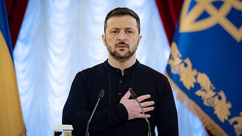 Ukrainian President Volodymyr Zelensky stands for the National anthem of Ukraine during an award ceremony in Kyiv, amid the Russian invasion in Ukraine. 