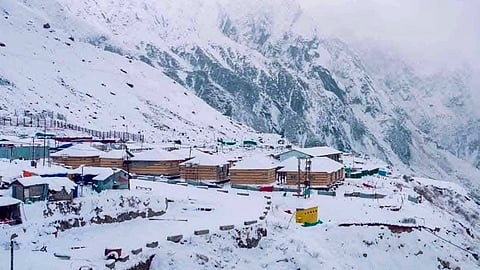 Houses in the Kedarnath shrine area after fresh snowfall in the Rudraprayag district of Uttarakhand