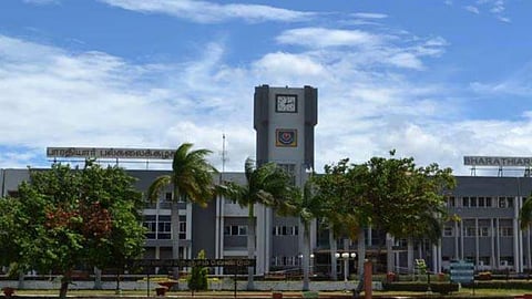 Around 300 farmers, whose lands were acquired by the state government in 1982 for the establishment of Bharathiar University, staged a sit-in protest in front of the collector's office