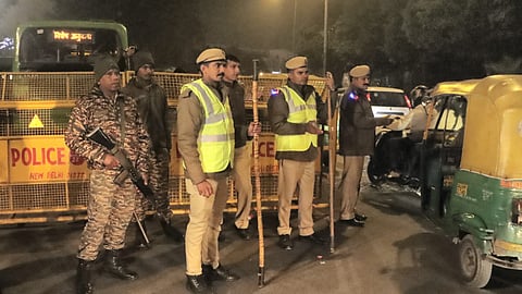 Police personnel keep vigil on the eve of New Year celebration, at Connaught Place in New Delhi, Tuesday, Dec. 31, 2024.