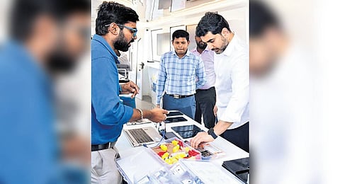 Minister Lokesh examines prototype of  AP-Maker-Lab-On-Wheels.