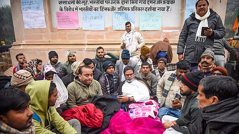 Jan Suraaj chief Prashant Kishor with others during his indefinite hunger strike demanding the cancellation of the 70th Integrated Combined Competitive Examination (CCE) in Patna.