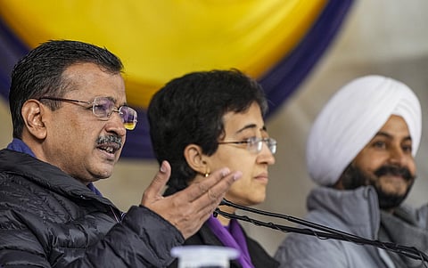 AAP national convener Arvind Kejriwal with Delhi CM Atishi. 