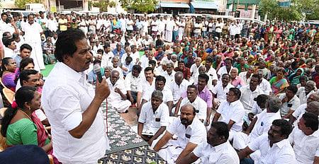 Minister P Moorthy addressing the meeting in A Vellalapatti near Madurai