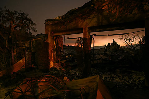 The remains of a destroyed home are seen during the Palisades Fire in Pacific Palisades, a neighborhood of Los Angeles, California, on January 9, 2025. 