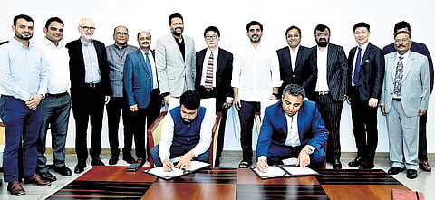 Piyush Bichhoriya, Managing Director of Indichip, and Saikanth Varma, CEO of APEDB, sign an MoU for setting up of a Rs 14,000 crore Fab unit at Orvakal 