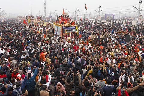 FILE- Prayagraj: Jagadguru Rambhadracharya during a procession of Shri Digambar Ani Akhara  towards the Sangam to take the first 'Amrit Snan' at the Mahakumbh