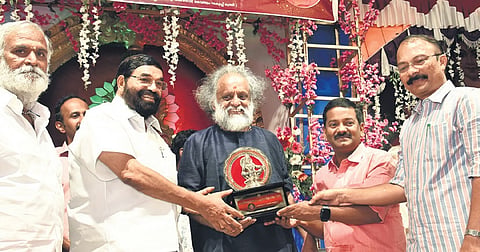 Devaswom Minister V  N Vasavan presents Harivarasanam Award to lyricist Kaithapram Damodaran Nampoothiri at Sabarimala 
on Tuesday 